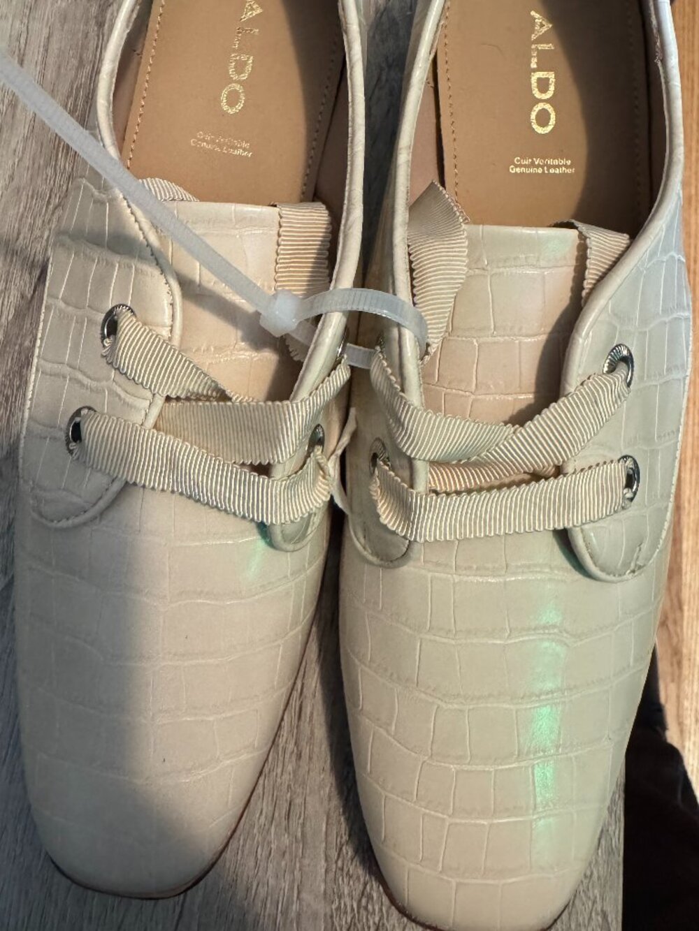 ALDO women's oxford dress shoes in a clean, crisp white.